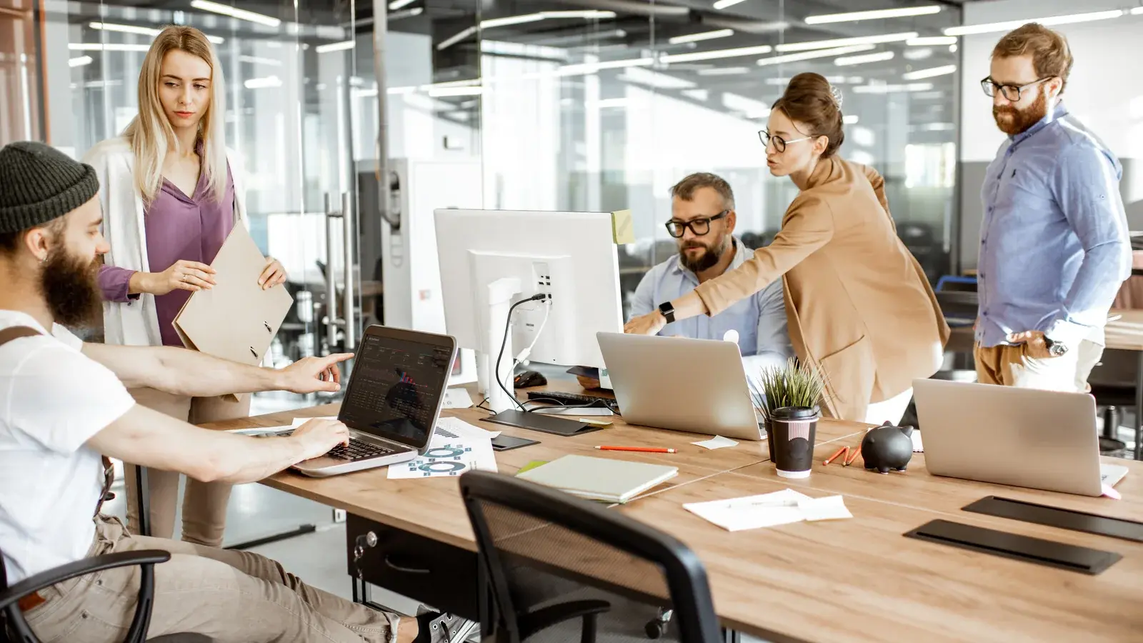 A team working together at computers.